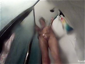 pornstar Romi Rain brings her camera in the bathroom