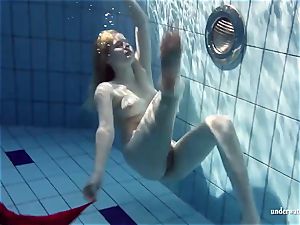 warm blond Lucie French teenager in the pool